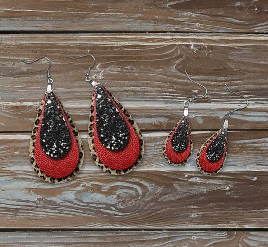 black glitter, red leather and animal print earrings. Printed