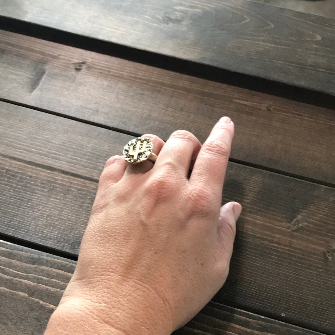 Worn goldstone cactus ring